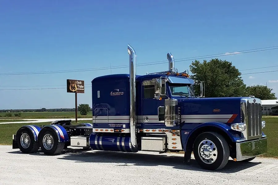 Blue Farmers Oil Peterbilt tractor